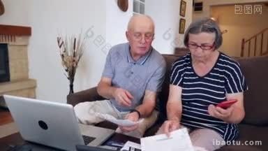 紧张的老夫妇在家里用笔记本电脑计算账单，退休人员对账单的成本感到沮丧